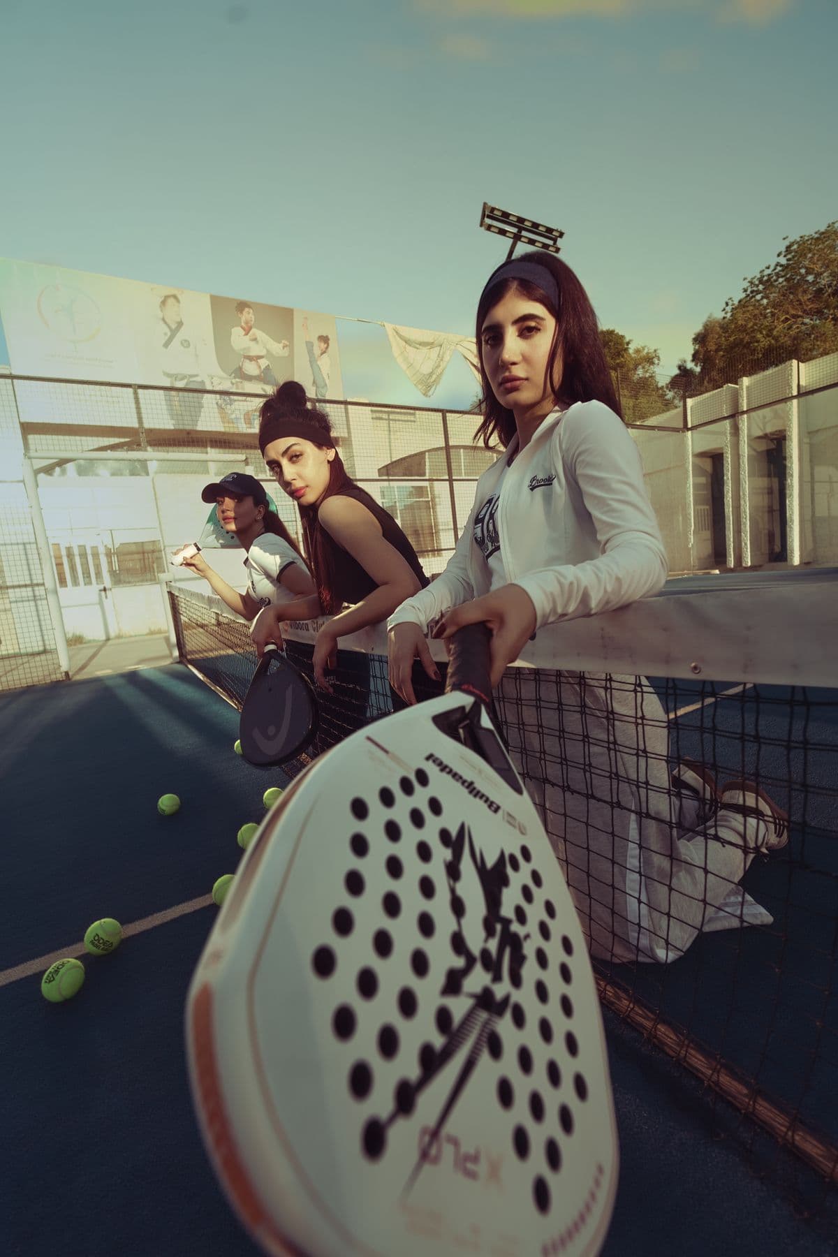 Friends meeting for a casual padel game
